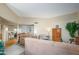 Open-concept living room with neutral walls and multiple sofas for comfortable seating and entertaining at 10443 W Loma Blanca Dr, Sun City, AZ 85351