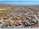Aerial view of a beautiful desert home community with convenient access to highway and mountain views at 10649 E Saddle Blanket Trl, Gold Canyon, AZ 85118