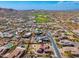 Breathtaking aerial view highlighting this property's proximity to a beautifully maintained golf course at 10649 E Saddle Blanket Trl, Gold Canyon, AZ 85118