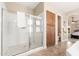 Bright bathroom features a large glass-enclosed shower, tile floors and built in storage at 10649 E Saddle Blanket Trl, Gold Canyon, AZ 85118
