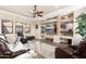 Inviting living room with hardwood floors, comfortable seating, and natural light at 10649 E Saddle Blanket Trl, Gold Canyon, AZ 85118
