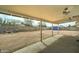 Expansive back patio with a neutral surface, covered ceiling, and seating is perfect for entertaining at 11509 E Marguerite Ave, Mesa, AZ 85208