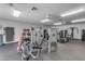 Well-equipped community gym with modern weight machines and fitness accessories at 11671 S Jokake St, Phoenix, AZ 85044