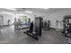 Community gym featuring a variety of weight machines and fitness equipment for residents at 11671 S Jokake St, Phoenix, AZ 85044