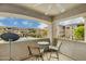 Balcony with seating and community view of the pool and landscaping at 14000 N 94Th St # 2144, Scottsdale, AZ 85260