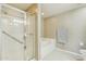 Clean and modern bathroom featuring a glass-enclosed shower and a relaxing soaking tub at 14000 N 94Th St # 2144, Scottsdale, AZ 85260