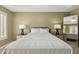 Bedroom featuring tray ceilings, natural light from window, and calming design at 14000 N 94Th St # 2144, Scottsdale, AZ 85260