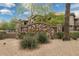 Stone community sign featuring lovely greenery and beautiful desert landscaping at 14000 N 94Th St # 2144, Scottsdale, AZ 85260