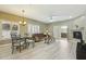 Relaxing living room with a balcony access and a fireplace and a dining room at 14000 N 94Th St # 2144, Scottsdale, AZ 85260