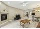 Comfortable living room with a fireplace and open floor plan at 14000 N 94Th St # 2144, Scottsdale, AZ 85260