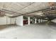 Well-lit parking garage featuring designated parking spots and visible infrastructure for convenient vehicle storage at 14000 N 94Th St # 2144, Scottsdale, AZ 85260