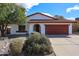 Lovely single-story home with desert landscaping, a red tile roof, and an attached two-car garage at 14401 N 22Nd St, Phoenix, AZ 85022