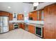 Bright kitchen featuring stainless steel appliances, granite countertops, and custom cabinetry at 14401 N 22Nd St, Phoenix, AZ 85022