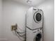 Convenient laundry area featuring a stacked washer and dryer set at 14401 N 22Nd St, Phoenix, AZ 85022
