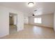 Spacious living room featuring tile floors, neutral paint, and a bright window at 14401 N 22Nd St, Phoenix, AZ 85022