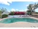 Relaxing in-ground pool with patio, garden area, and lush plants providing privacy at 14401 N 22Nd St, Phoenix, AZ 85022
