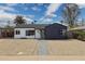 Charming single-story home with a well-manicured front yard and a quaint walkway at 1621 W Mulberry Dr, Phoenix, AZ 85015