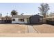 Charming single-story home with a well-maintained front yard and stylish exterior paint scheme at 1621 W Mulberry Dr, Phoenix, AZ 85015