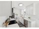 Bright kitchen featuring stainless-steel appliances, light countertops and cabinets, and light flooring at 1621 W Mulberry Dr, Phoenix, AZ 85015