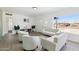 Bright living room with lots of natural light, neutral colors, and comfortable seating arrangement at 1621 W Mulberry Dr, Phoenix, AZ 85015