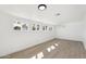 Room with updated flooring and white walls that offers ample natural light through multiple windows at 1621 W Mulberry Dr, Phoenix, AZ 85015