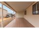 Spacious carport with direct access to the home's entrance and additional storage at 17200 W Bell Rd # 77, Surprise, AZ 85374