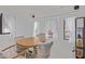Well-lit dining room with a round table, perfect for Gathering meals and gatherings at 17200 W Bell Rd # 77, Surprise, AZ 85374