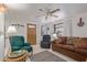 Comfortable living room with ample seating and natural light, creating an inviting atmosphere at 17200 W Bell Rd # 77, Surprise, AZ 85374