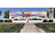 Exterior view of the Surprise Regional Library, featuring public art and landscaping at 17541 W Statler Dr, Surprise, AZ 85388