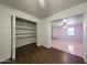 Dining room area with wood-look floors and closet space near another room at 1763 W Pepper Pl, Mesa, AZ 85201