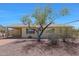 Charming single-story home with covered parking and desert landscaping at 1763 W Pepper Pl, Mesa, AZ 85201
