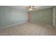 Inviting living room features neutral paint, tile flooring, and ample natural light at 1763 W Pepper Pl, Mesa, AZ 85201