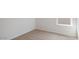 Neutral colored carpet flooring with white walls and baseboards at 1828 W Sheridan Ave, Apache Junction, AZ 85120