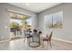 Elegant dining area leading to outdoor patio, perfect for seamless indoor-outdoor living at 18324 W Highland Ave, Goodyear, AZ 85395