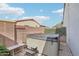 Relaxing backyard featuring a private hot tub, perfect for unwinding after a long day and a beautiful desert landscaped yard at 18327 N Summerbreeze Way, Surprise, AZ 85374