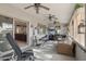 Spacious sunroom with workout equipment and comfortable seating at 18327 N Summerbreeze Way, Surprise, AZ 85374