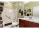 Bathroom featuring a tub and shower combination with a modern vanity at 19932 N Ibis Way, Maricopa, AZ 85138