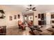 Comfortable living room featuring tile floors, neutral paint, and an open layout at 19932 N Ibis Way, Maricopa, AZ 85138
