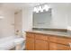 Clean bathroom featuring a shower, tub, and vanity with ample storage space and granite counters at 200 E Southern Ave # 117, Tempe, AZ 85282