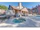 Relaxing community hot tub with brick surround, BBQ area, and comfortable seating at 200 E Southern Ave # 117, Tempe, AZ 85282