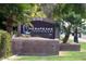 The Hesapeake Condominiums sign with palm trees and desert landscaping offers a welcoming atmosphere at 200 E Southern Ave # 117, Tempe, AZ 85282