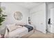 Well-lit bedroom featuring a daybed and closet, perfect for creating a comfortable and versatile living space at 22744 E Stonecrest Dr, Queen Creek, AZ 85142