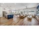 A modern open-plan living area that seamlessly blends the kitchen, dining, and living spaces at 22744 E Stonecrest Dr, Queen Creek, AZ 85142