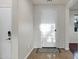 Bright foyer features tile flooring and a white front door at 2395 W Riverside St, Chandler, AZ 85248