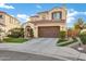 Charming two-story home with a beautiful tile roof, manicured landscaping and two car garage at 2395 W Riverside St, Chandler, AZ 85248