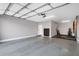 Large garage featuring epoxy floors, overhead storage, and lots of space at 2395 W Riverside St, Chandler, AZ 85248