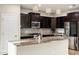 Eat-in kitchen with a large island and stainless steel appliances at 2395 W Riverside St, Chandler, AZ 85248