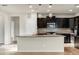 Eat-in kitchen with island and granite countertops at 2395 W Riverside St, Chandler, AZ 85248