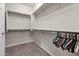 Spacious walk-in closet with ample shelving and hanging space at 2395 W Riverside St, Chandler, AZ 85248
