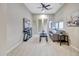 Bright living room featuring neutral tones, a comfortable sofa, and plenty of natural light at 29512 N 128Th Ln, Peoria, AZ 85383